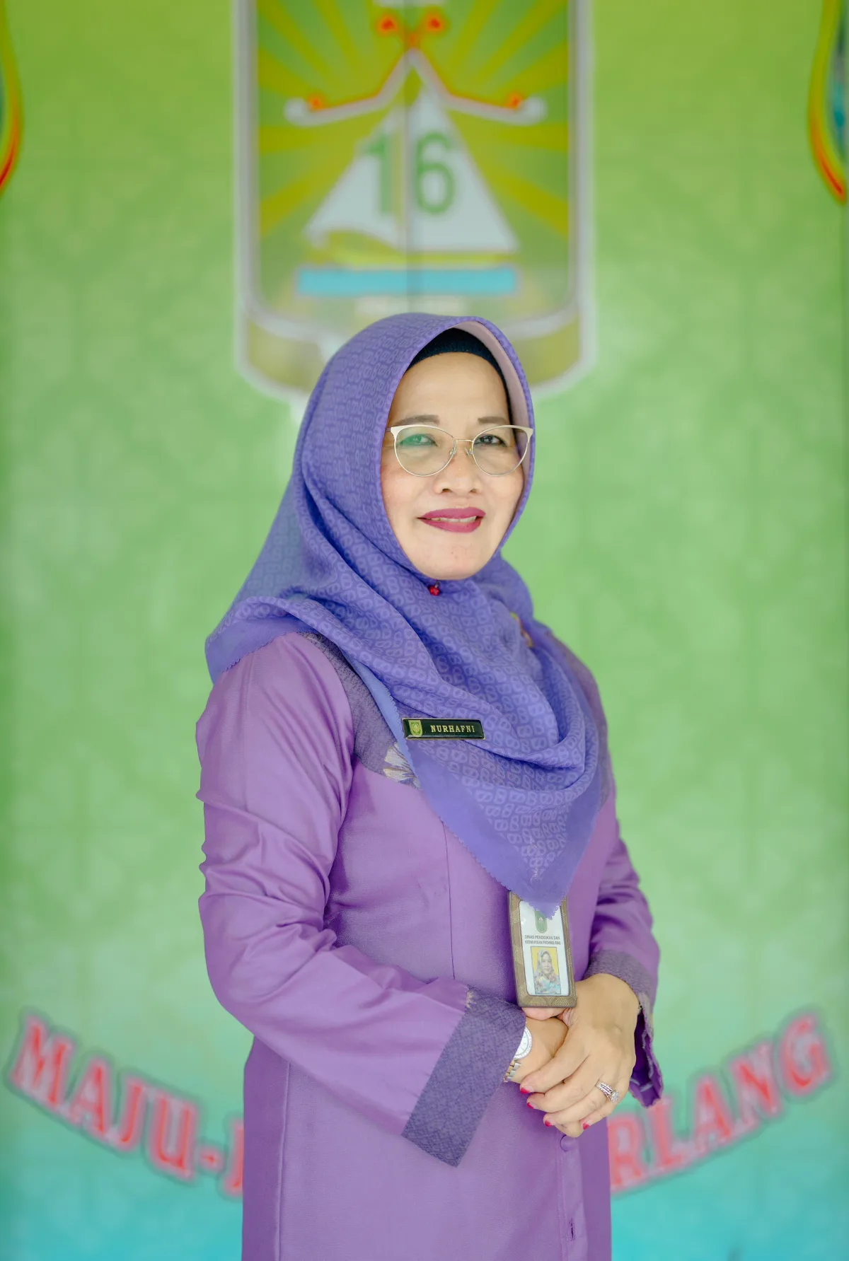 Dr. Hj. Nurhafni, M.Pd