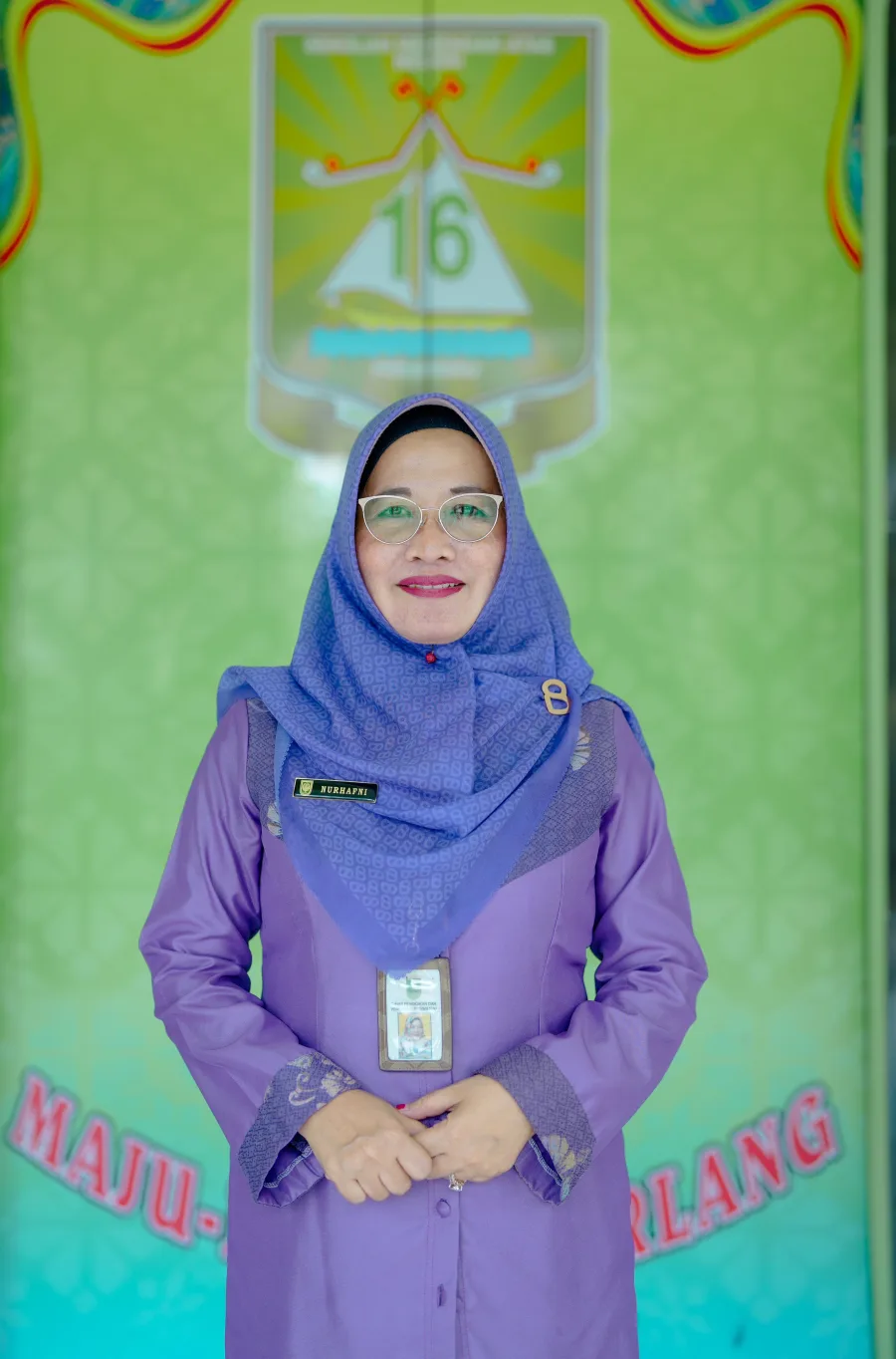Dr. Hj. Nurhafni, M.Pd